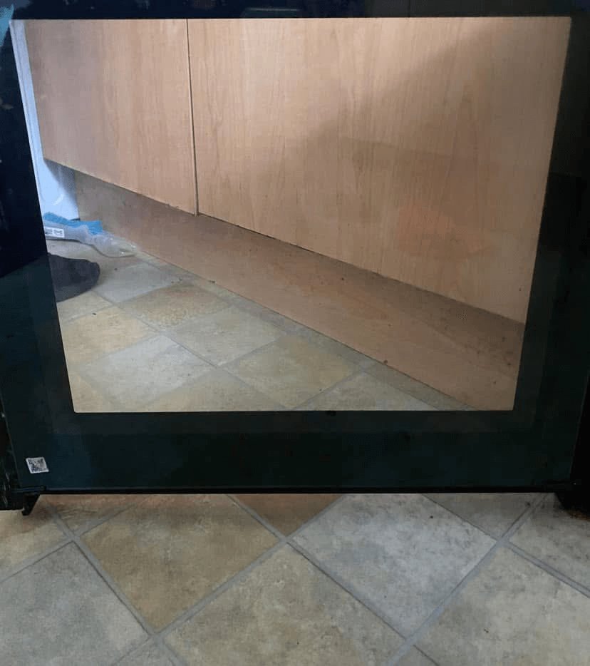The oven door cleaned and looking brand new