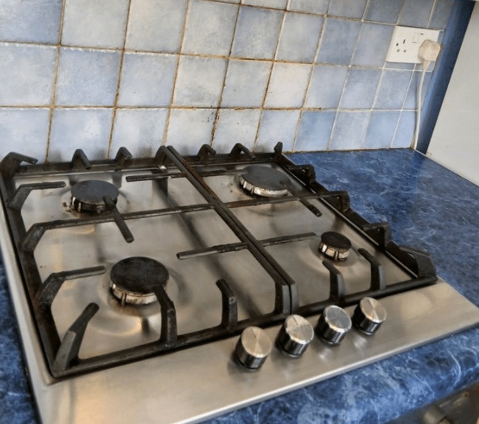 The cooker hob looking shiny and new